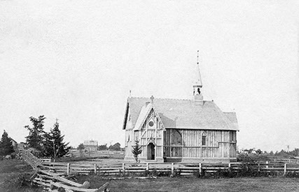 A black and white photo of a church

Description automatically generated